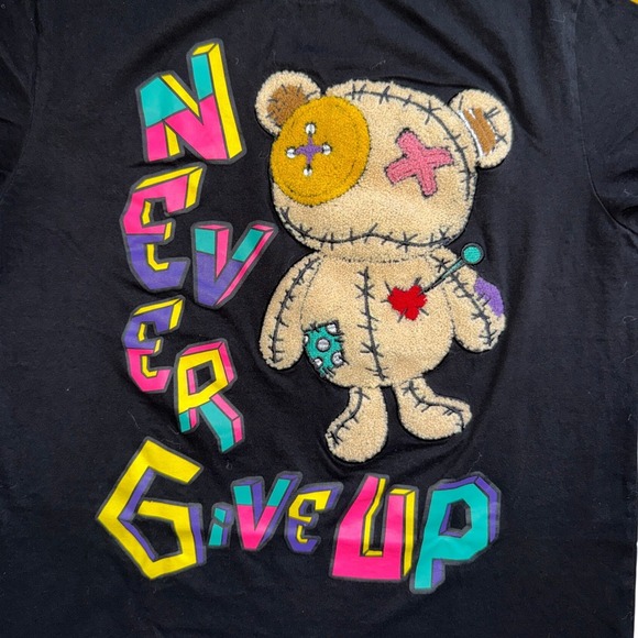 Switch Remarkable T Shirt Women Black Never Give Up Voodoo Bear Graphic Multi - Picture 4 of 8